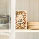 Novels Of Jane Austen Meghan Rader Strapped Handbag